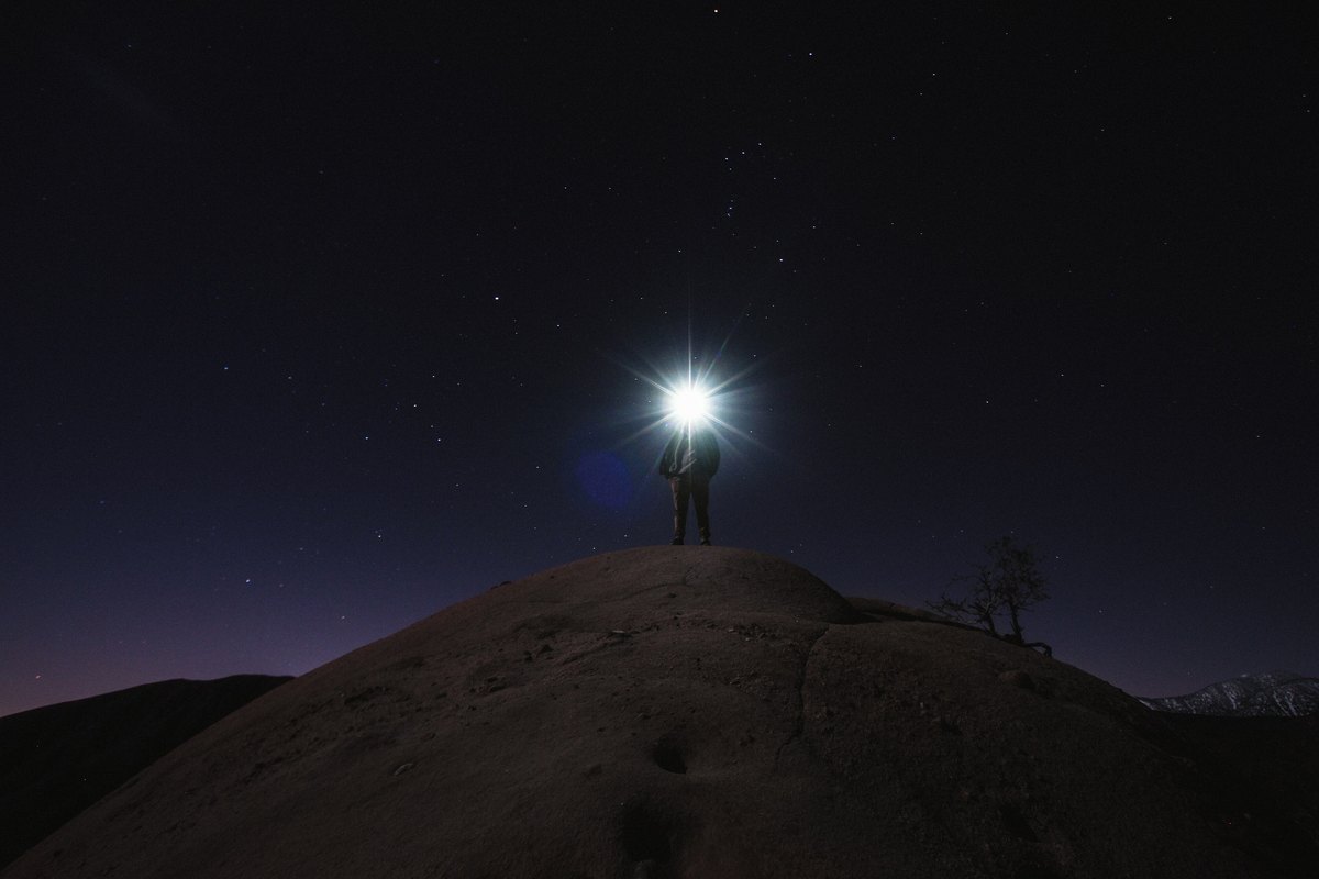 Motivated light in a real photo: one torch explains every bright surface and the direction of every shadow.